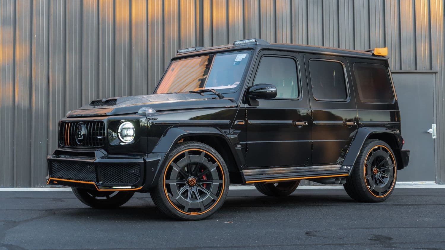 Brabus G-Wagon outside the shop at sunset