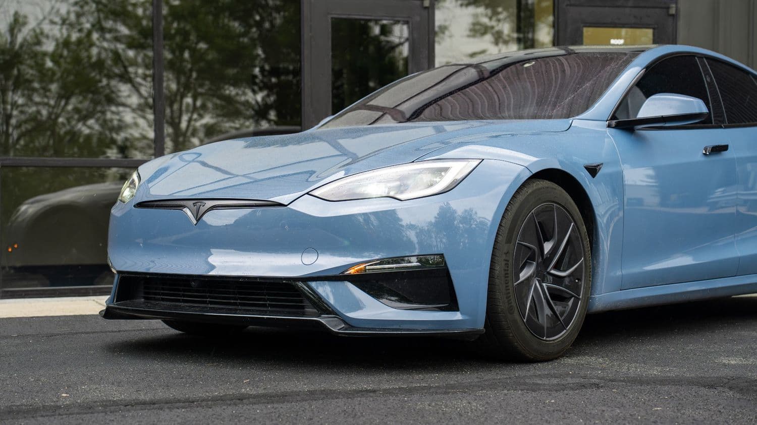 Model S Plaid front three-quarter with carbon splitter