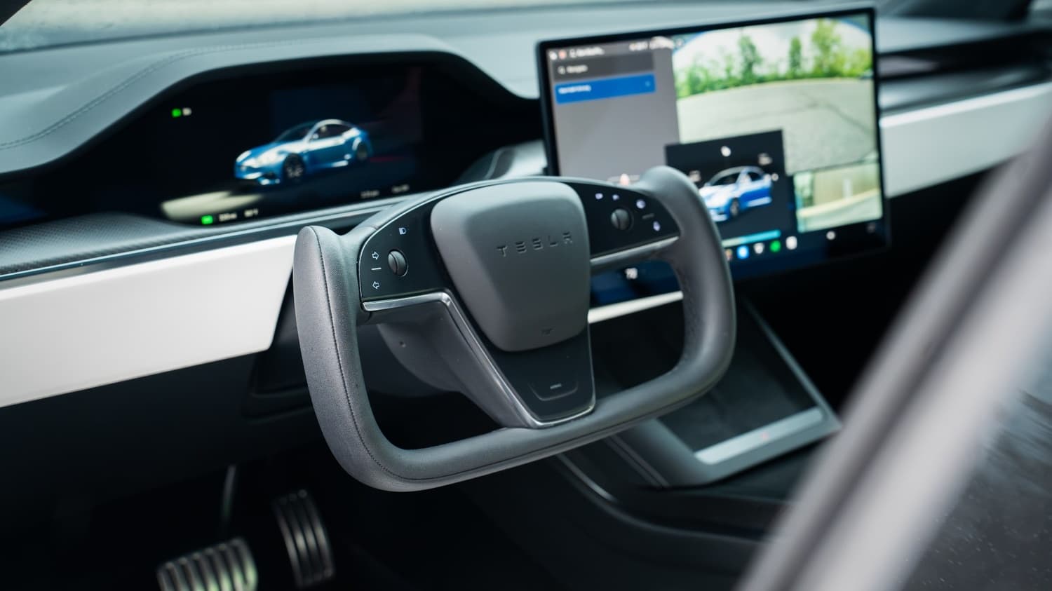 Tesla yoke steering wheel and cabin after detail