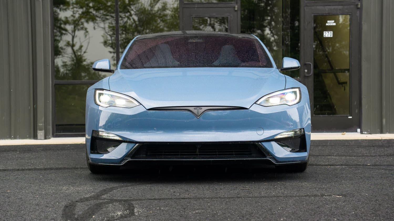 Model S Plaid head-on with tinted glass roof
