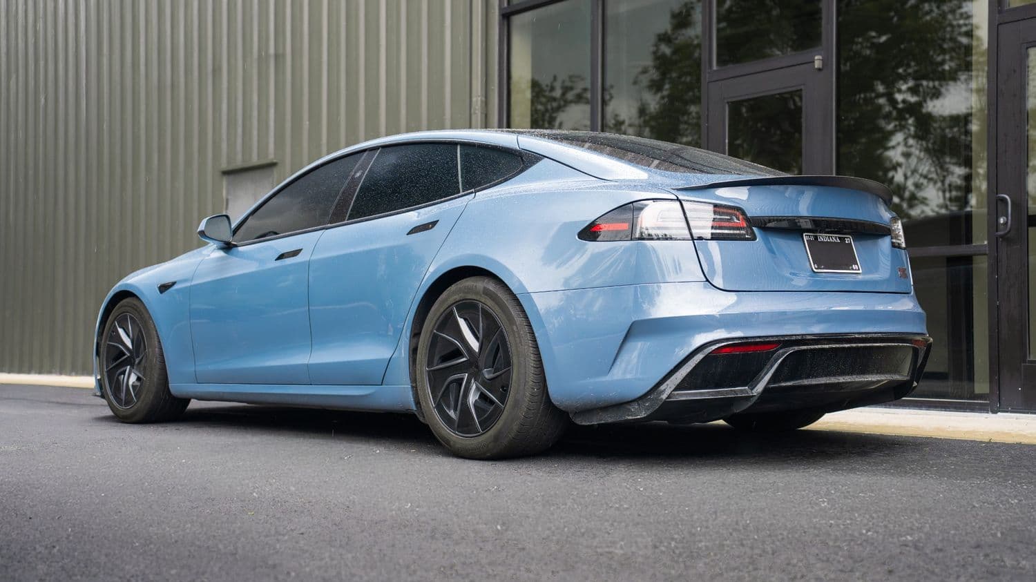 Model S Plaid rear three-quarter with carbon diffuser